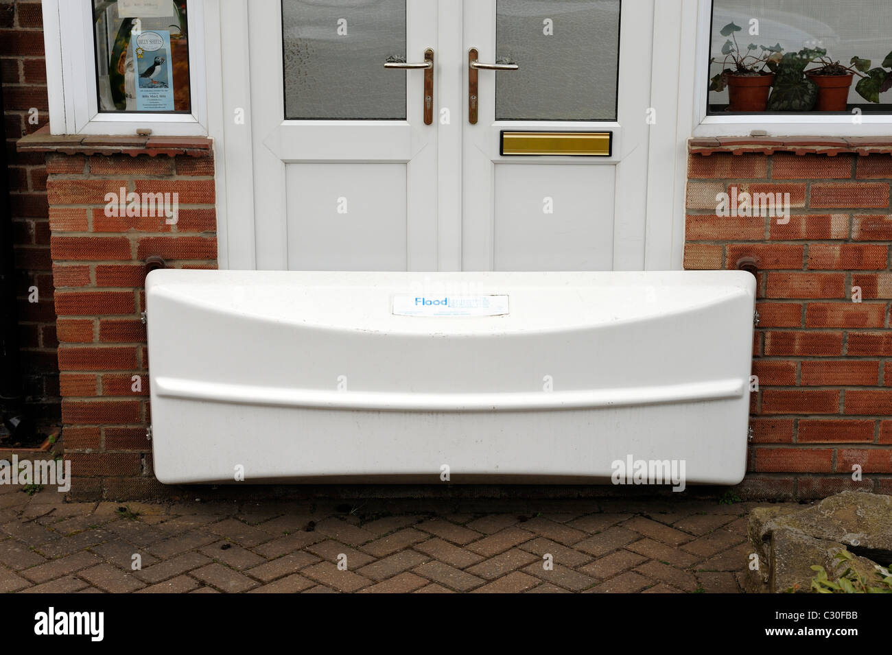 Verteidigung-Sperrwerks auf einem Haus Stockfoto