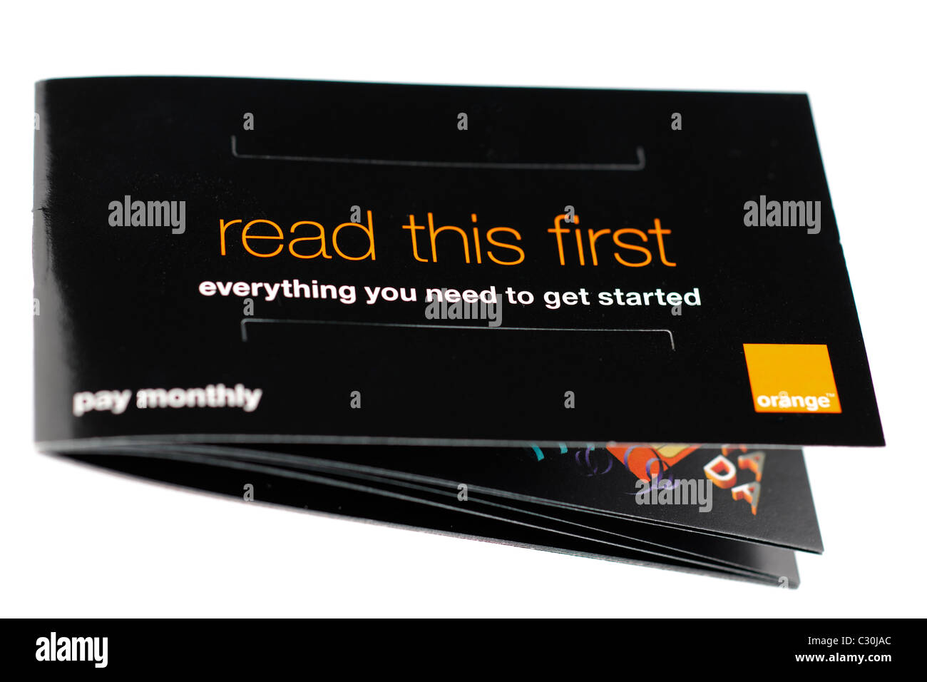 Orange Mobiltelefon-Broschüre mit dem Titel Lesen dieser ersten alles, was Sie brauchen um loszulegen. EDITORIAL NUR Stockfoto