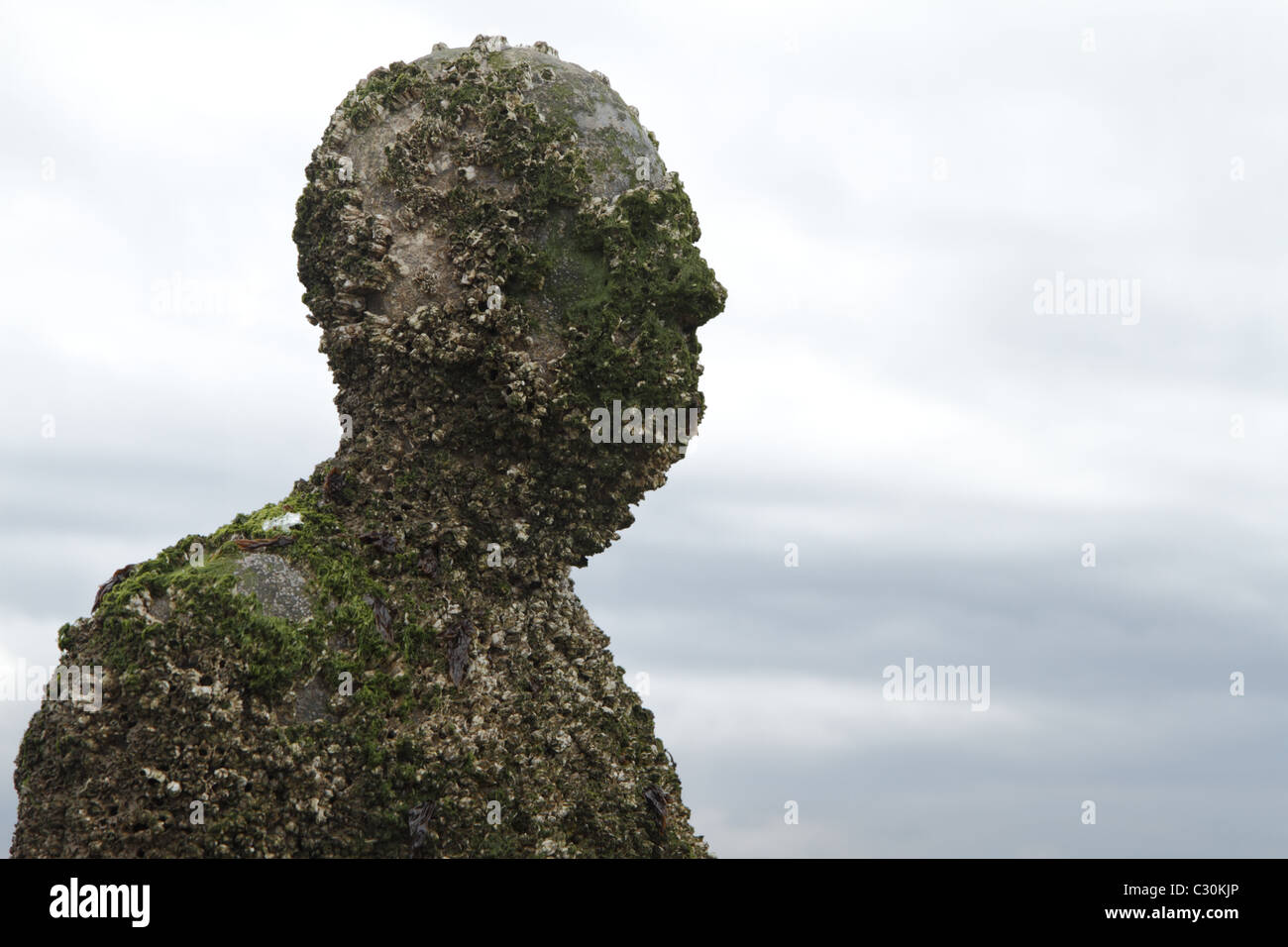 Antony Gormley ist ein weiterer Ort, Crosby, Merseyside Stockfoto