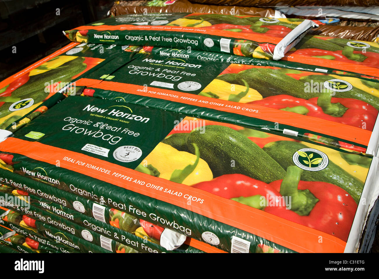 Taschen Haufen Innenaussaaten organische freie torfokompostom Stockfoto