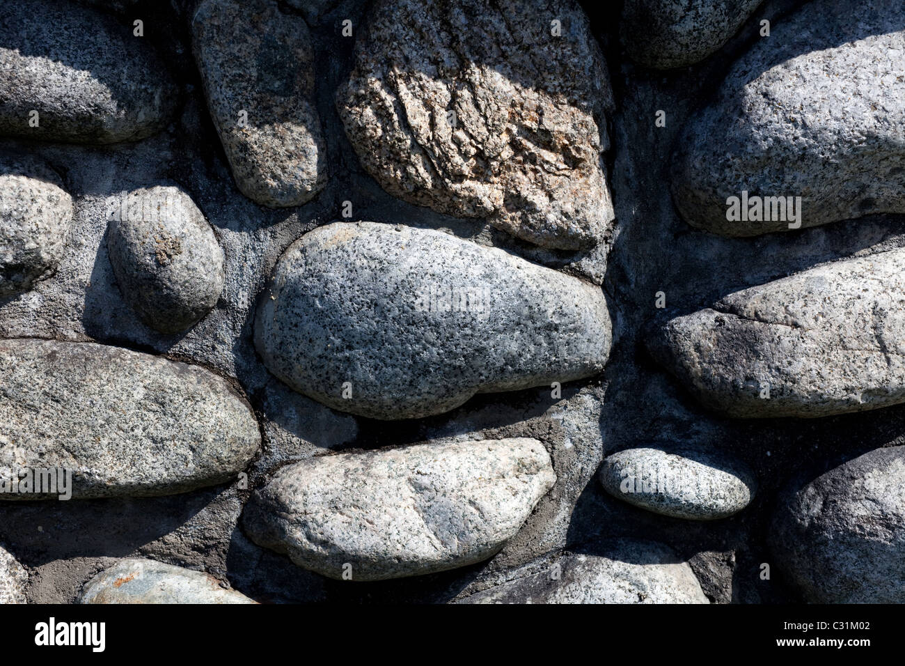 gerundet Fluss Felsen Wand für Hintergrund Stockfoto