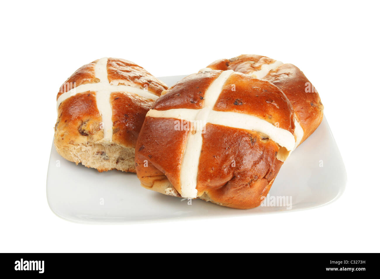 Hot Cross Buns auf einem Teller Stockfoto