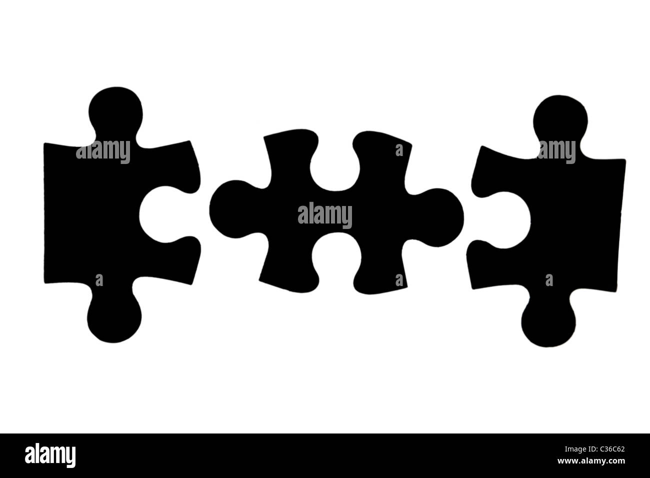 drei verschiedene schwarze Puzzleteile auf weißem Hintergrund Stockfoto