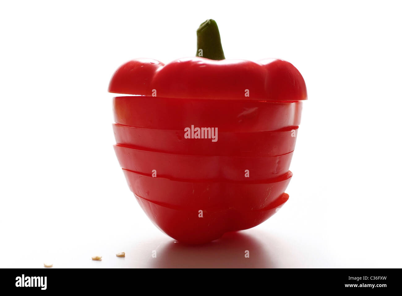 Eine rote Paprika Glocke, Stapel von Scheiben Stockfoto