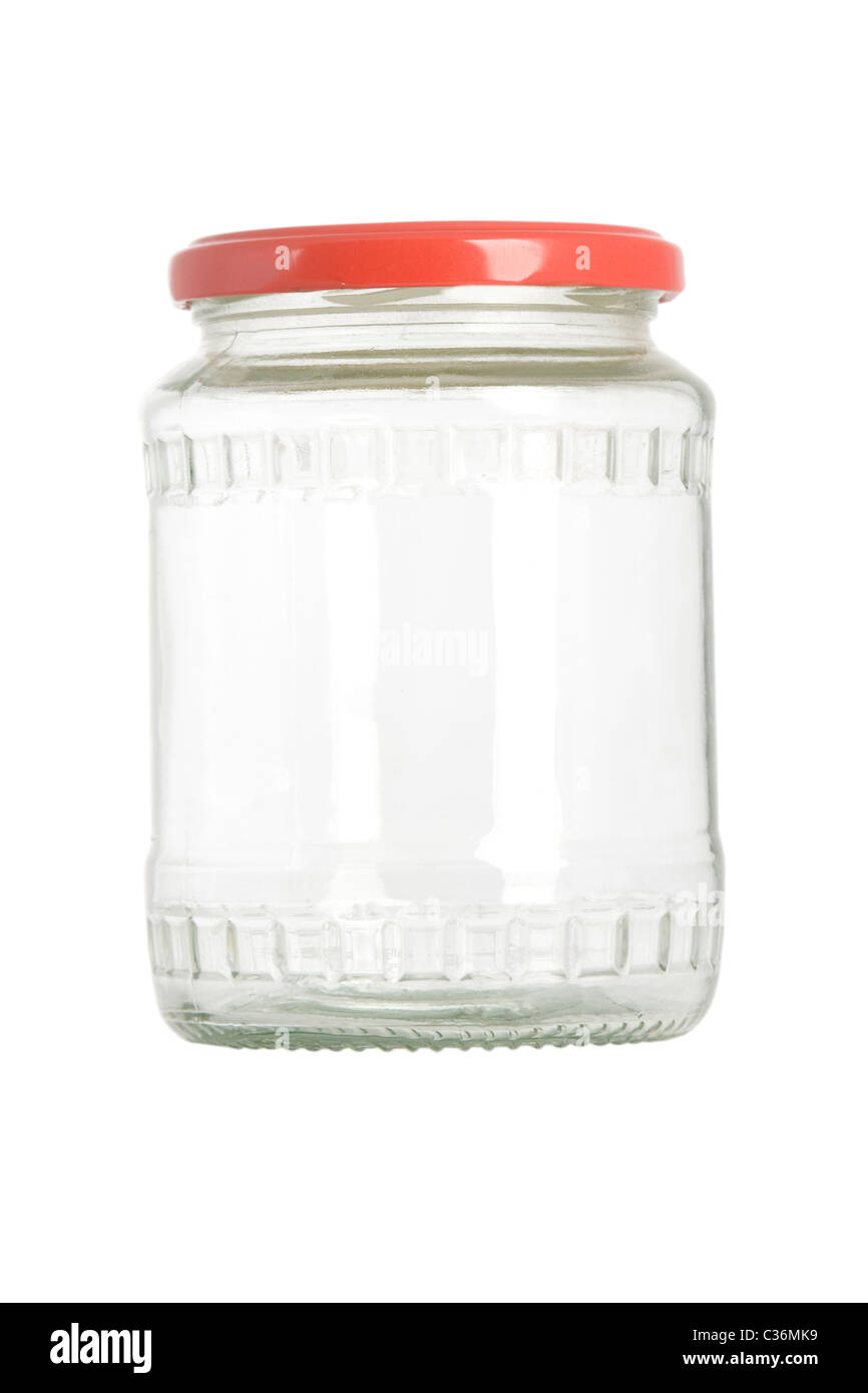 leeres Glas mit rotem Deckel auf weißem Hintergrund Stockfotografie