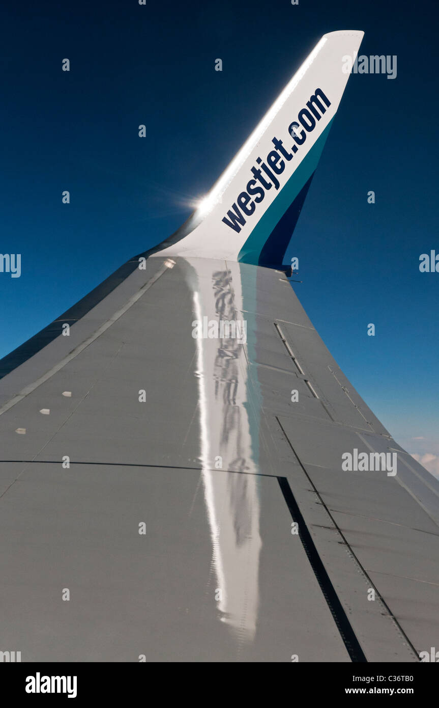 WestJet Werbung für ihre Website auf einer Boeing 737 Winglet. Stockfoto