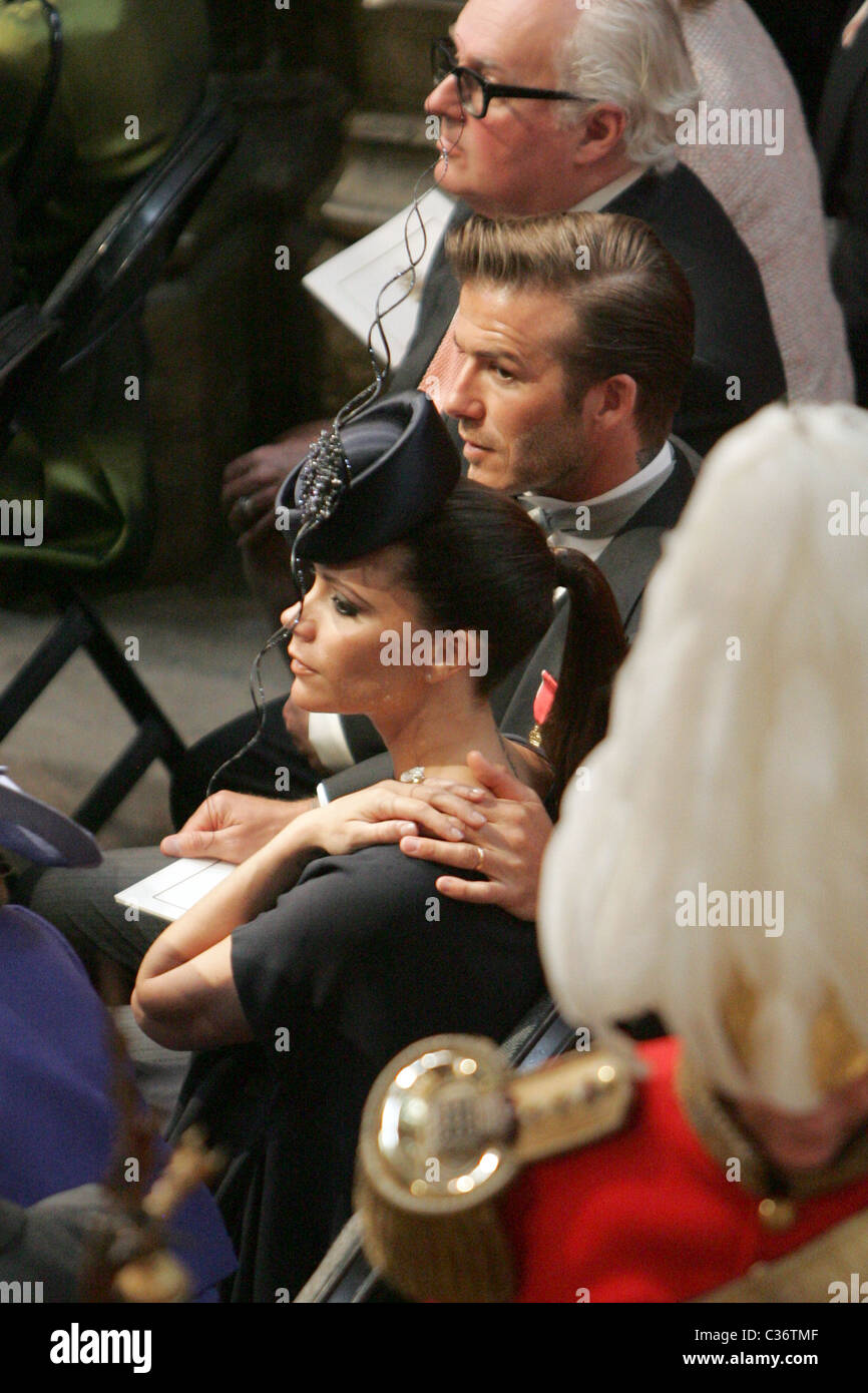 David und Victoria Beckham bei der Hochzeit von Prinz William und Catherine Middleton in Westminser Abbey Stockfoto