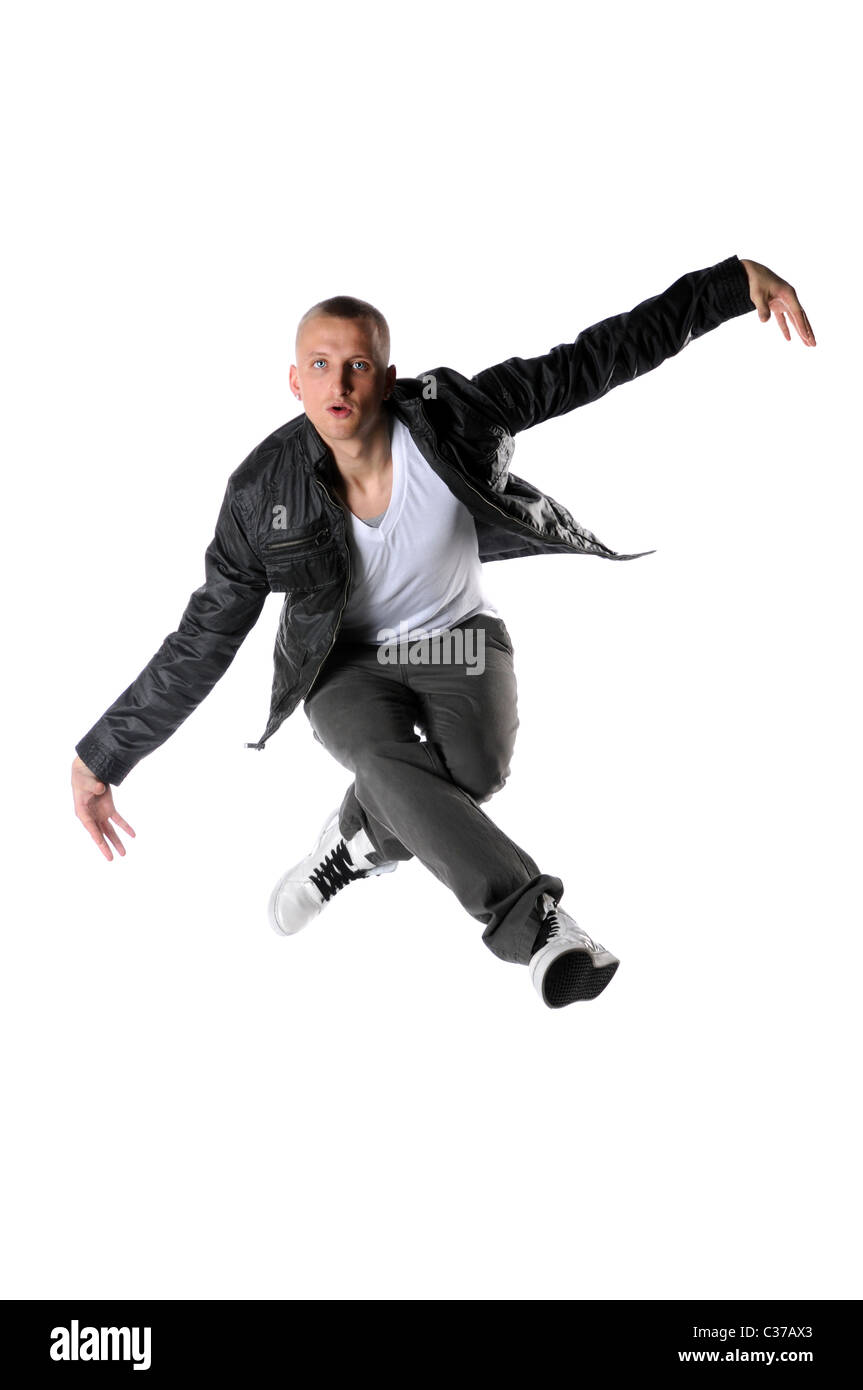 Junge Hip-Hop-Tänzer springen isoliert auf weißem Hintergrund Stockfoto