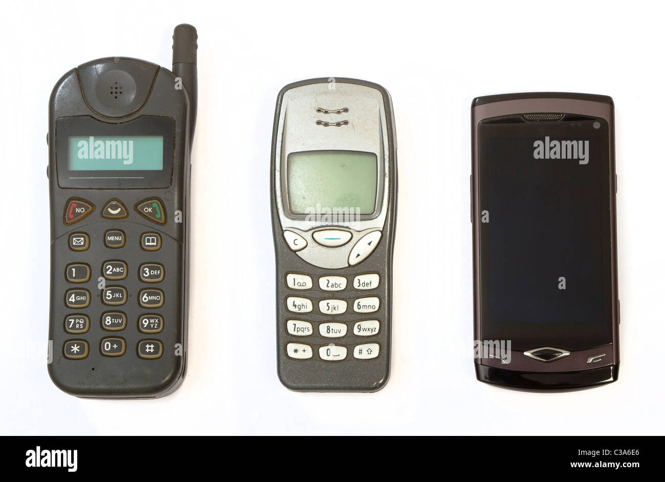 Handys von drei Generationen, sehr alt, mittlere alte und neue smartphone Stockfoto