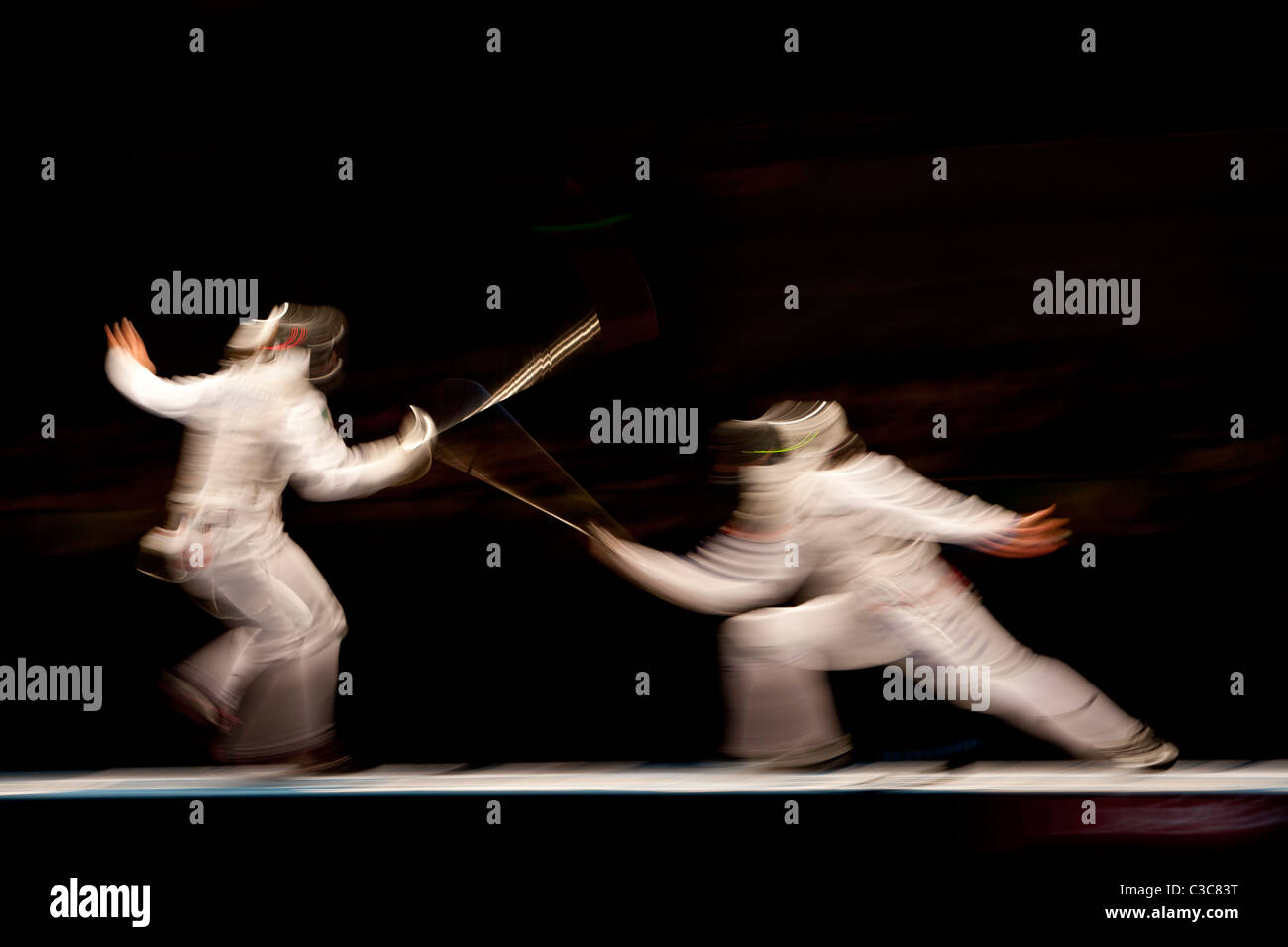 Verschwommene Aktion der Frauen Fechten-Wettbewerb bei den Olympischen Sommerspielen 2008, Peking, China Stockfoto
