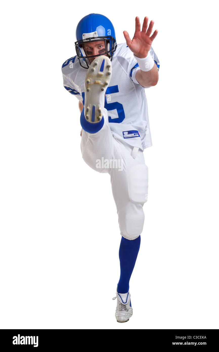 Foto eines American Football-Spielers Tritte, isoliert auf einem weißen Hintergrund. Stockfoto