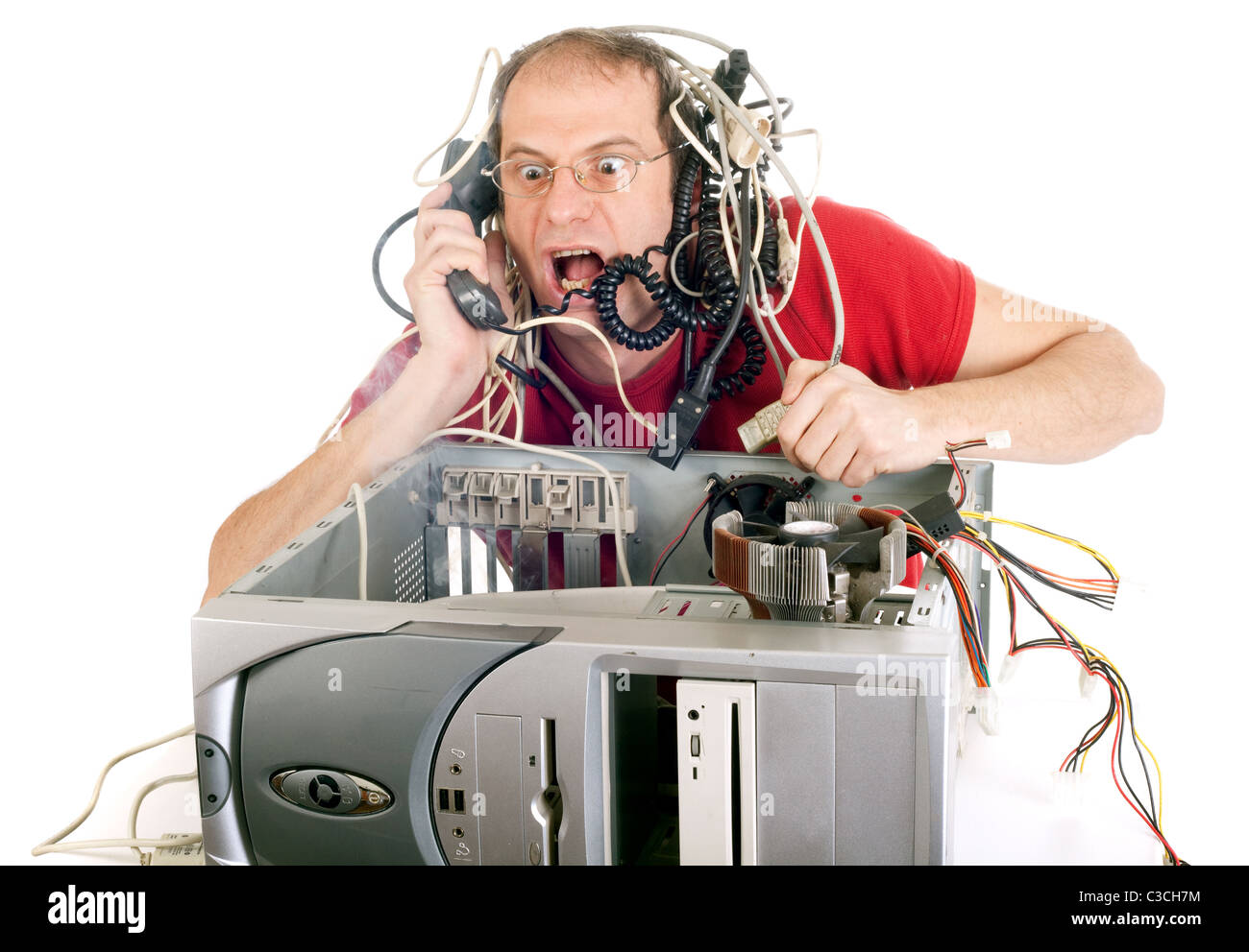 Mann in Panik mit seinem Computer Hotline erreichen möchten Stockfoto