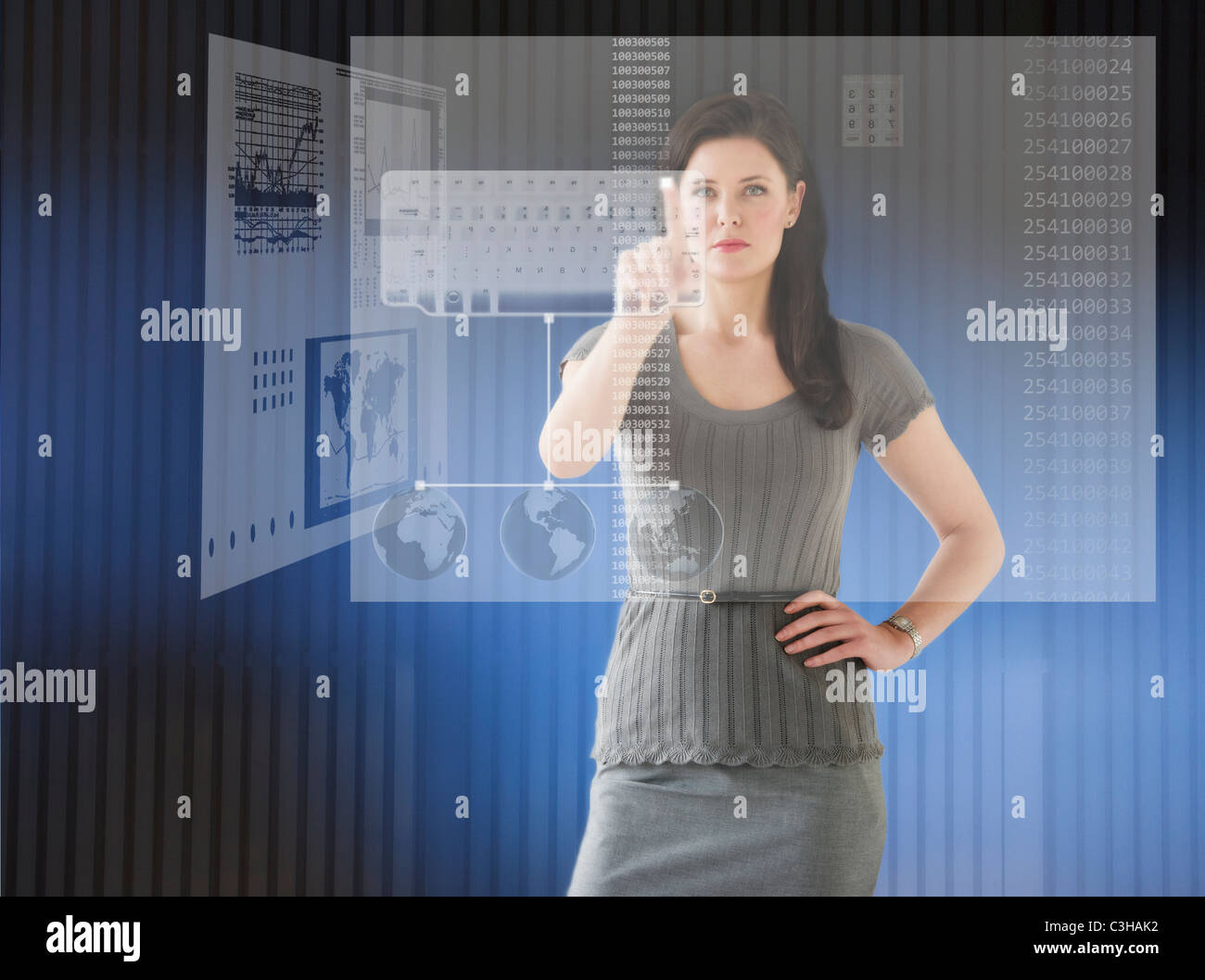 Frau im futuristischen Büro Computer berühren Stockfoto