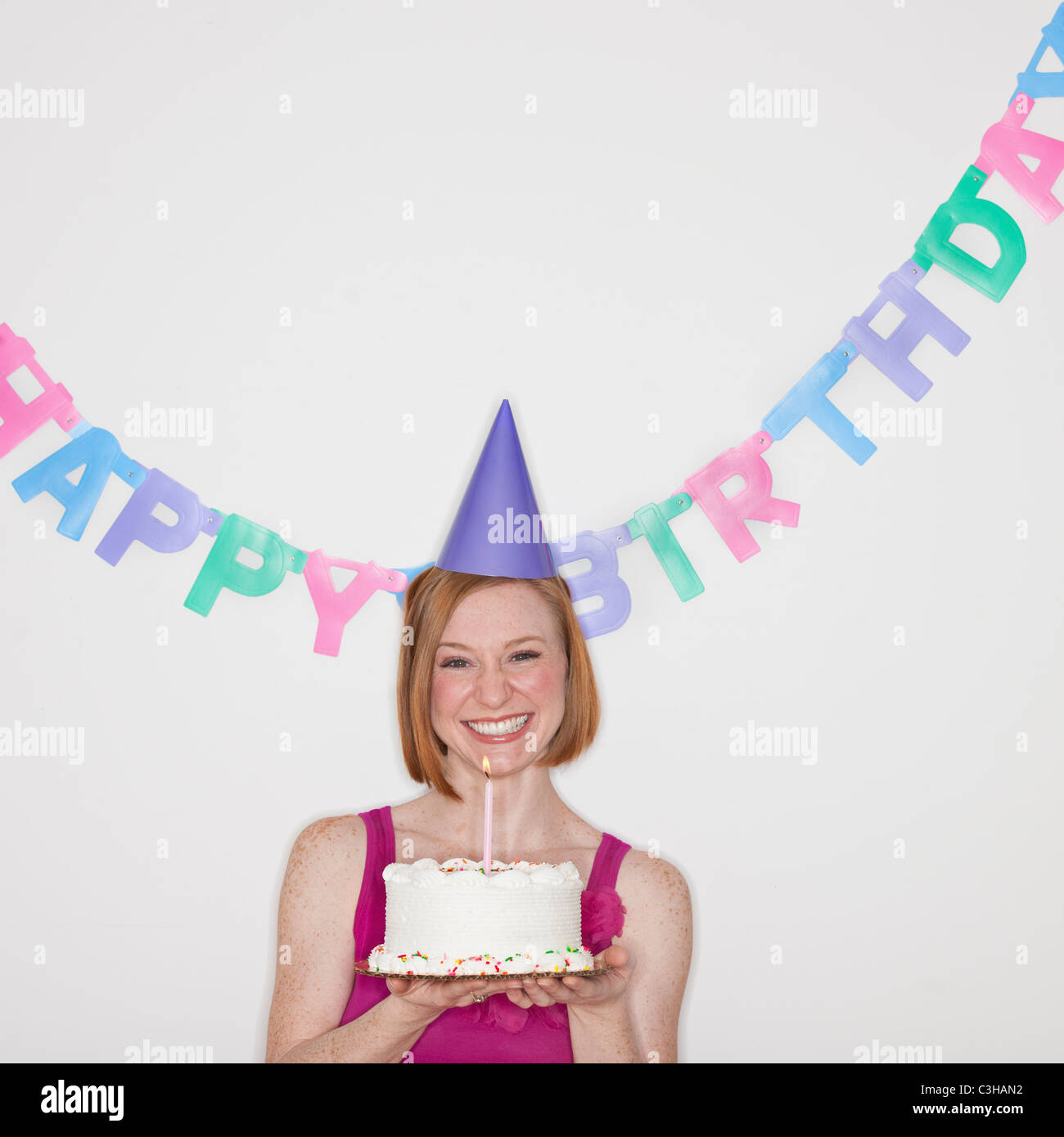 Porträt der Frau feiert Geburtstag Stockfoto