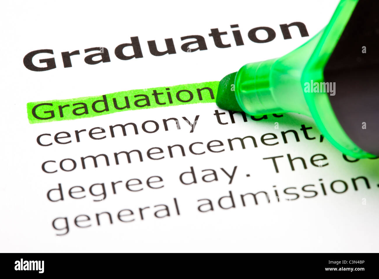 Makroaufnahme des Wortes "Graduation" grün markiert Stockfoto