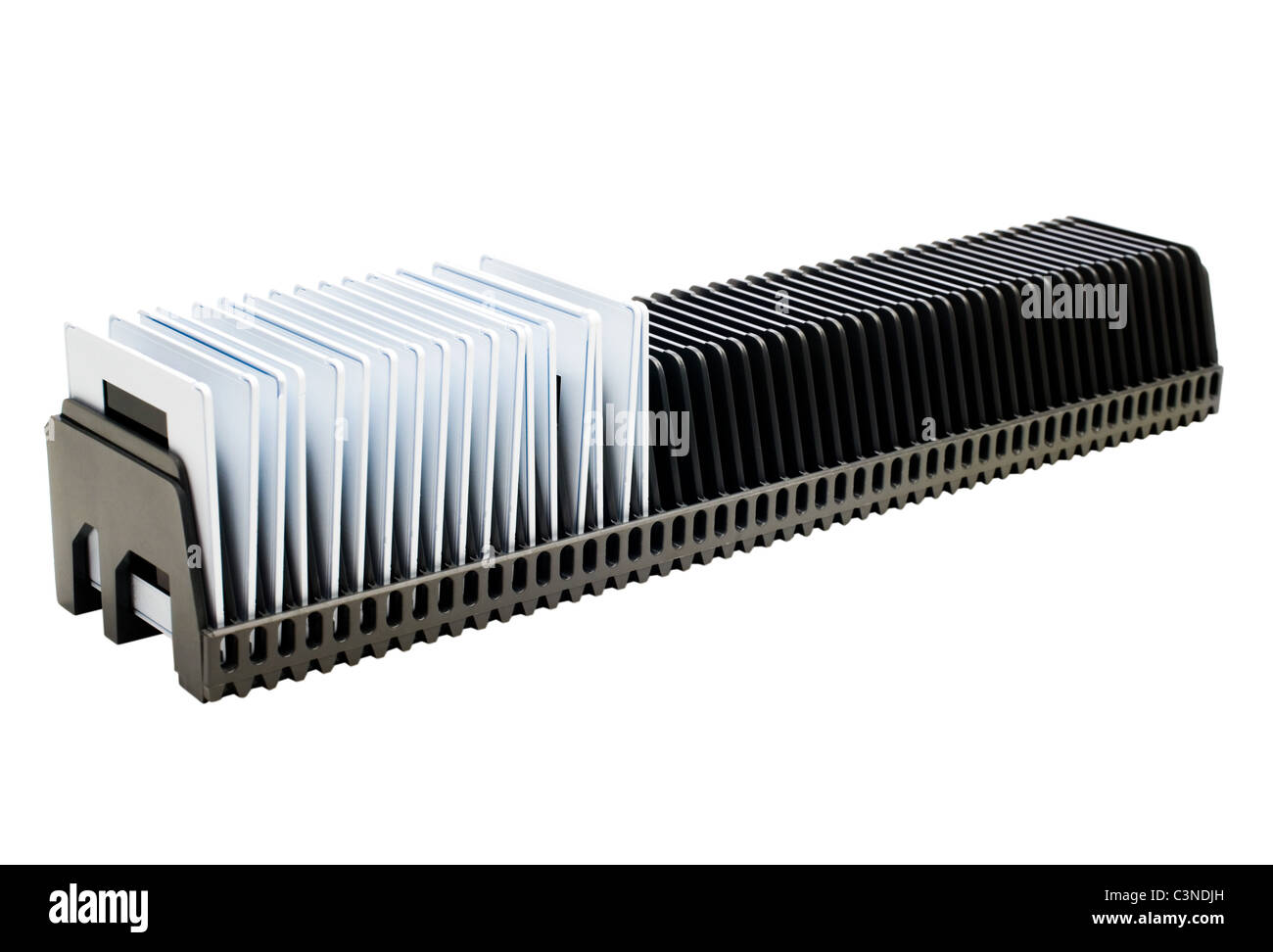 Folien in ein Diamagazin isoliert auf weiß Stockfoto