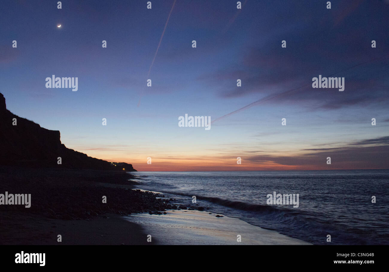 Nach Sonnenuntergang bei Cromer, entlang des Strandes in Richtung Ost Runton suchen. Stockfoto Nach Sonnenuntergang bei Cromer, entlang des Strandes in Richtung Ost Runton suchen. Stockfoto
