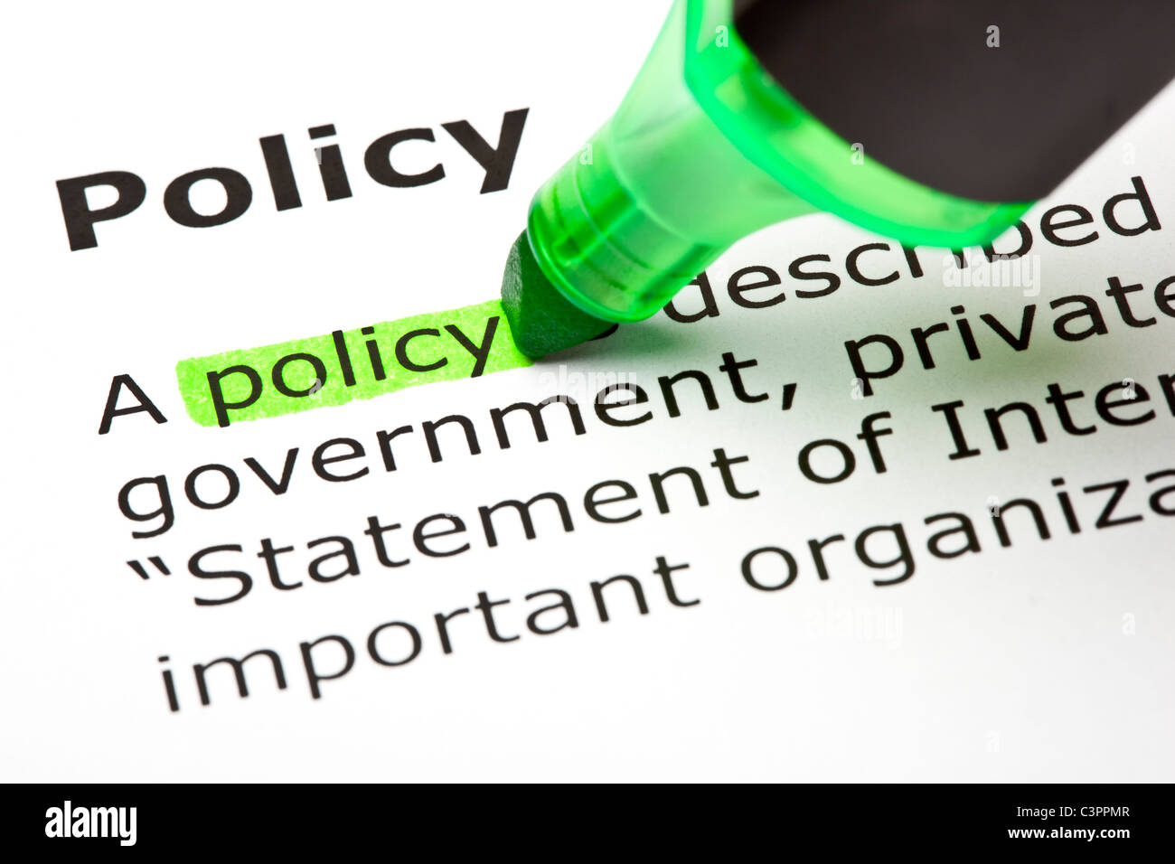 Das Wort "Politik" grün markiert Stockfoto