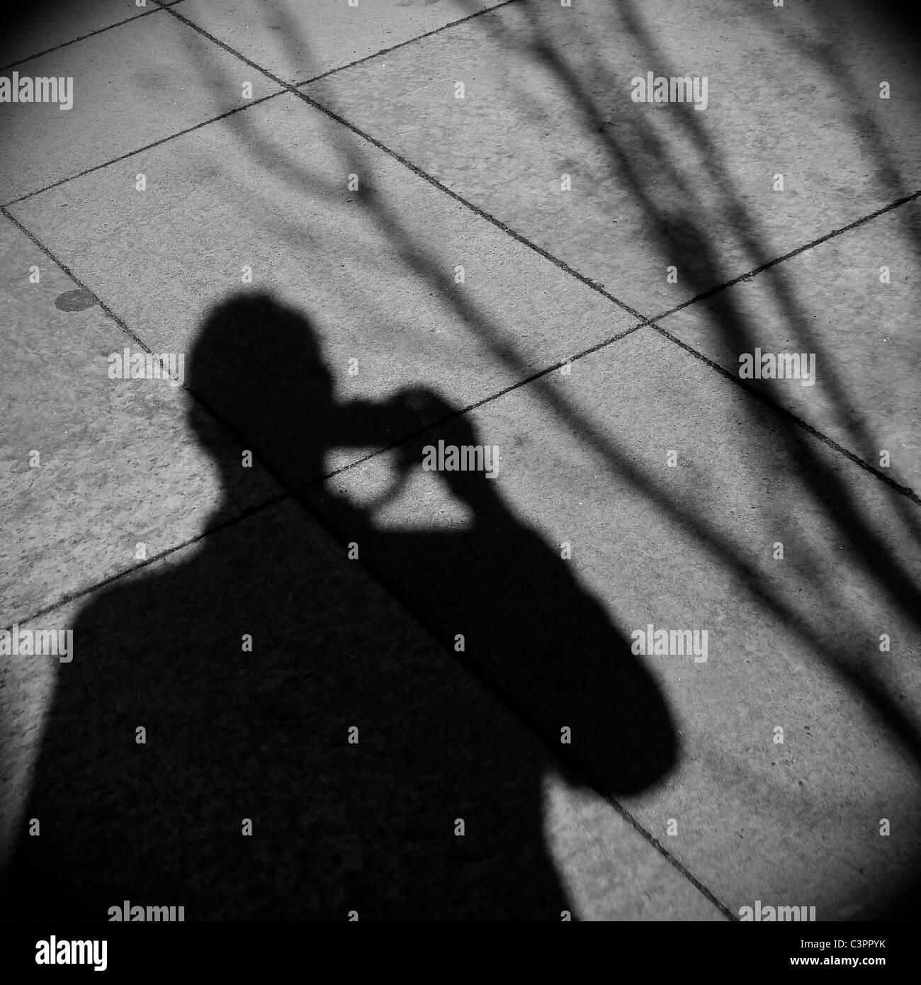 Schatten des Mannes mit dem fotografieren. Stockfoto