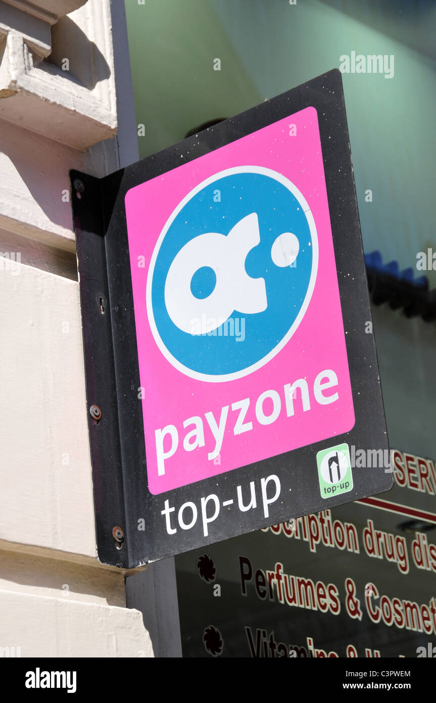 Payzone Telefon aufladen Zeichen Geld Zahlungen ATM Bargeld Rechnungen Komfort Stockfoto
