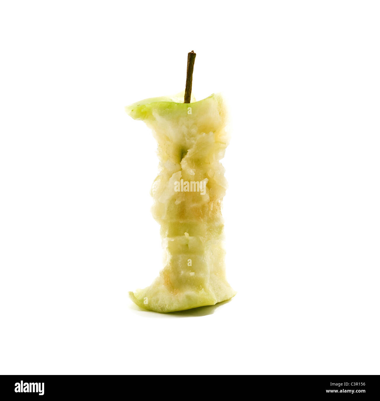 Grüner Apfel mit Biss Stockfoto