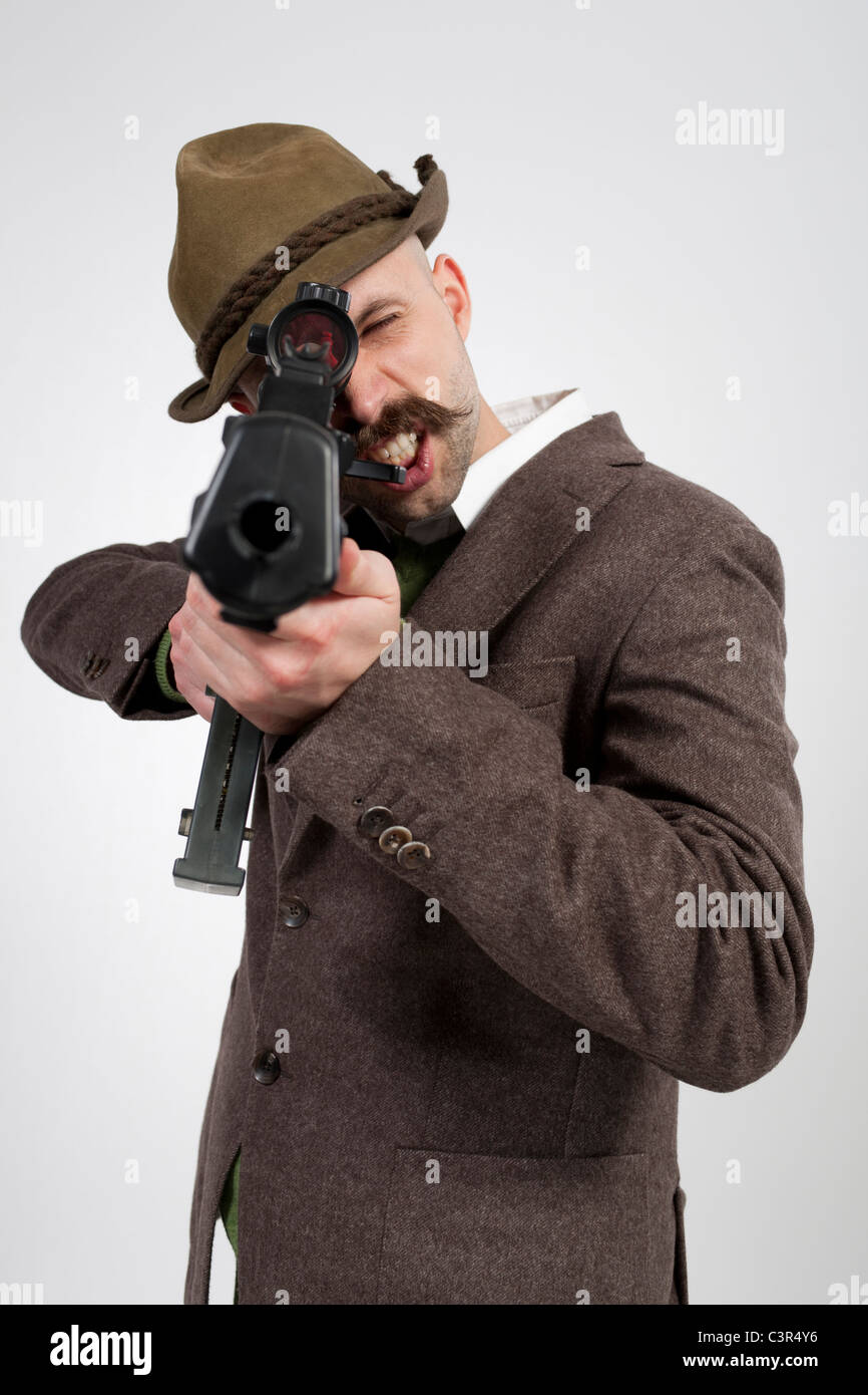 Mann-Betrieb-Maschinenpistole Stockfoto