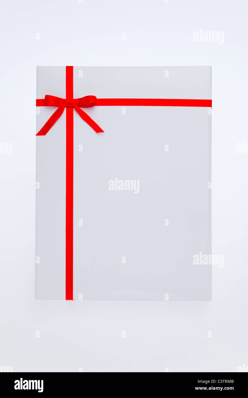 Red Ribbon auf Weihnachtsgeschenk Stockfoto