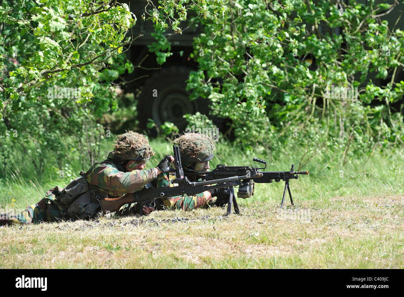 Belgische Infanterie Soldaten feuern Minimi M2 und MAG M2 Maschinengewehren während des Trainings, Belgien Stockfoto