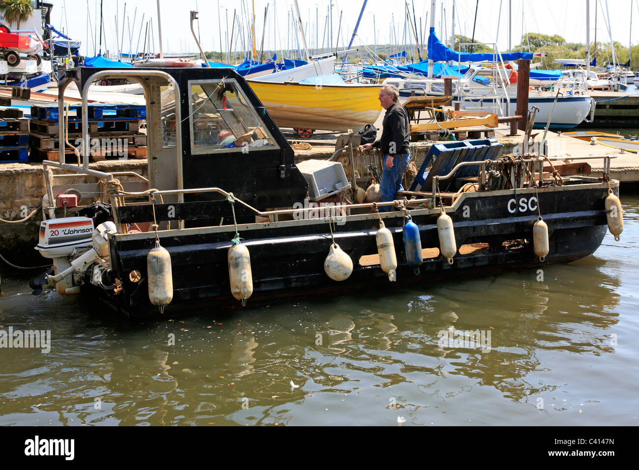 Kleinboot Woking in Christchurch Kai Dorset Stockfoto