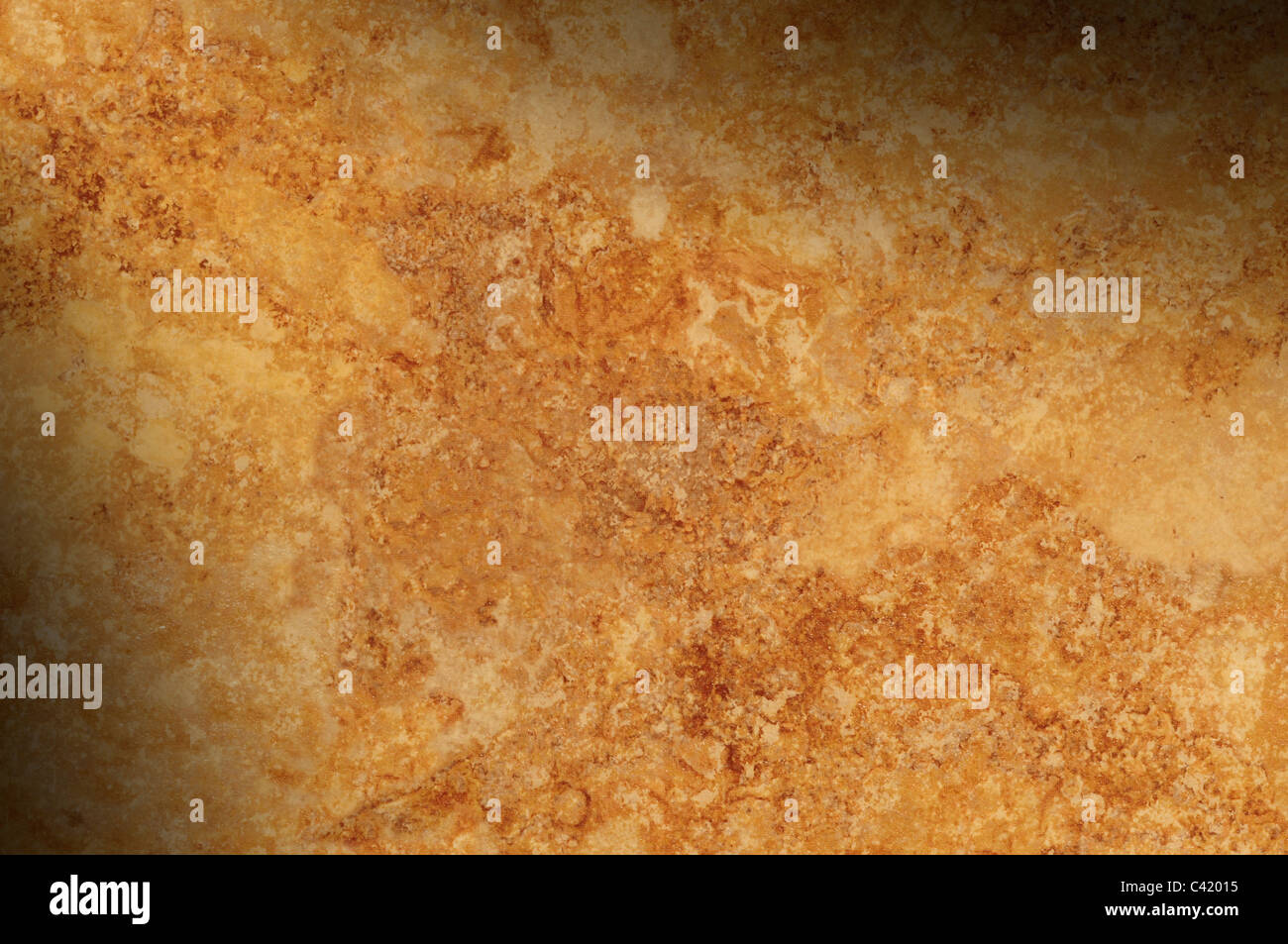Braun gesprenkelte Oberfläche Hintergrundtextur beleuchtet diagonal Stockfoto