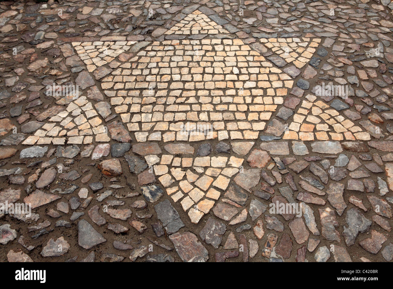 Ein Davidstern dar Kopfsteinpflaster in Cáceres, Extremadura, Spanien. Stockfoto