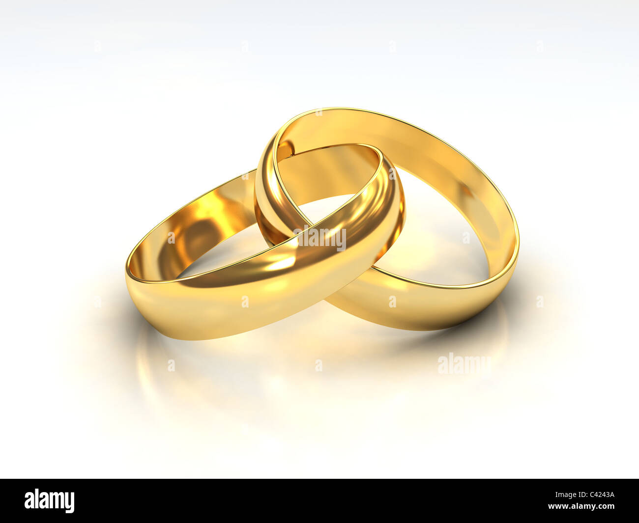 Ein paar goldene Hochzeit Ringe auf weißem Hintergrund Stockfoto
