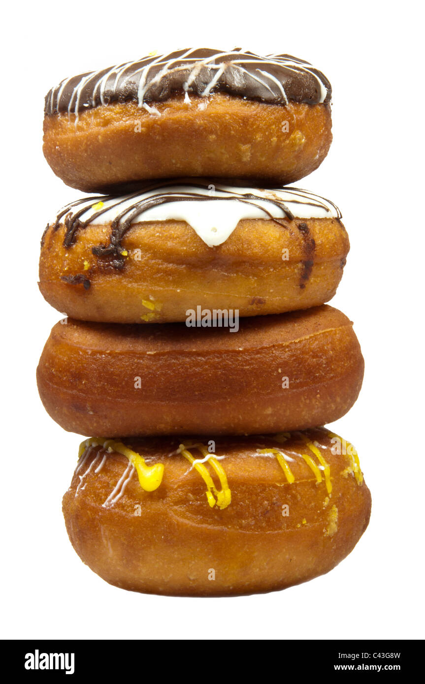 Haufen von Donuts in weißem Hintergrund Stockfoto