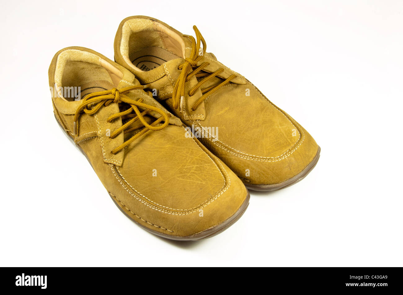 Braune Schuh paar auf weißem Hintergrund Stockfoto