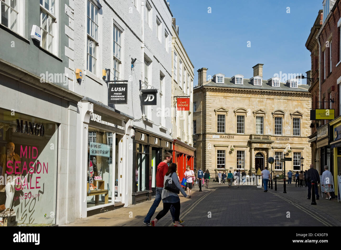 Geschäfte entlang der Coney Street im Stadtzentrum Und St. Helens Square York North Yorkshire England UK United Großbritannien GB Großbritannien Stockfoto