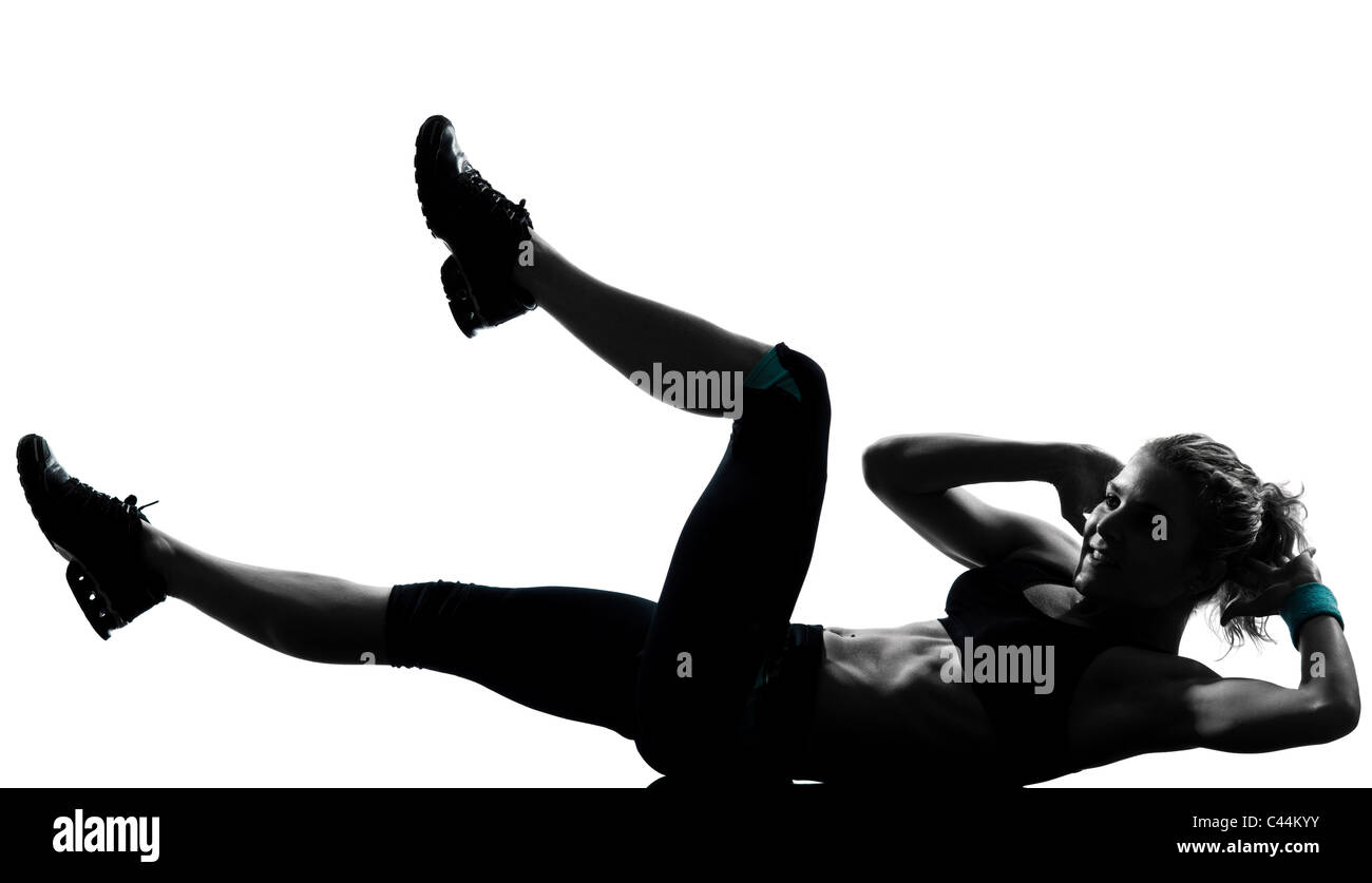 eine Frau, die Ausübung Workout Fitness aerobic-Übungen Bauchmuskeln Push Ups Haltung auf weißem Hintergrund Studio isoliert Stockfoto