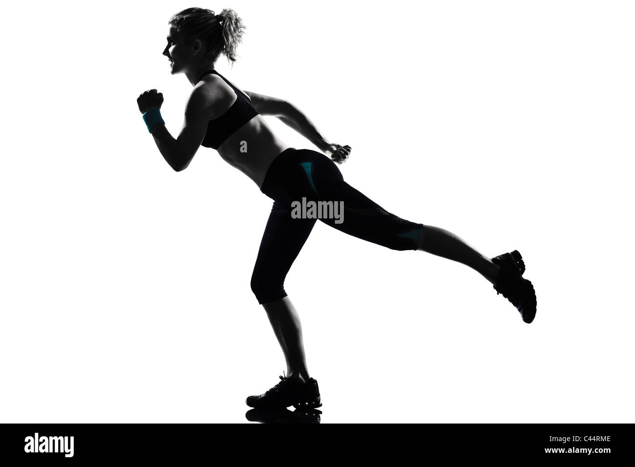 eine Frau, die Ausübung Workout Fitness aerobic-Übungen Körperhaltung auf weißem Hintergrund Studio isoliert Stockfoto