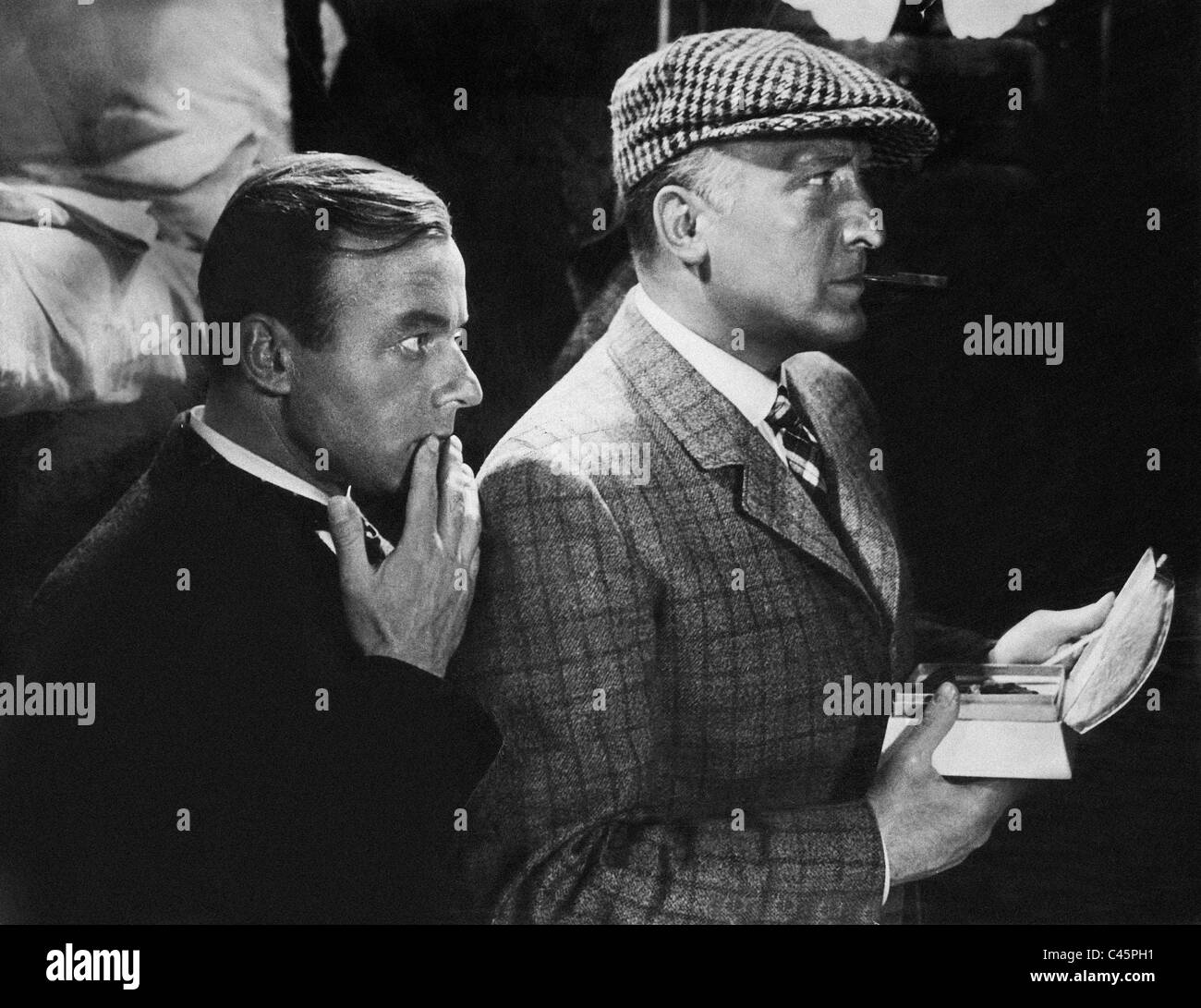 Heinz Ruehmann und Hans Albers in "Der Mann, der Sherlock Holmes war", 1937 Stockfoto