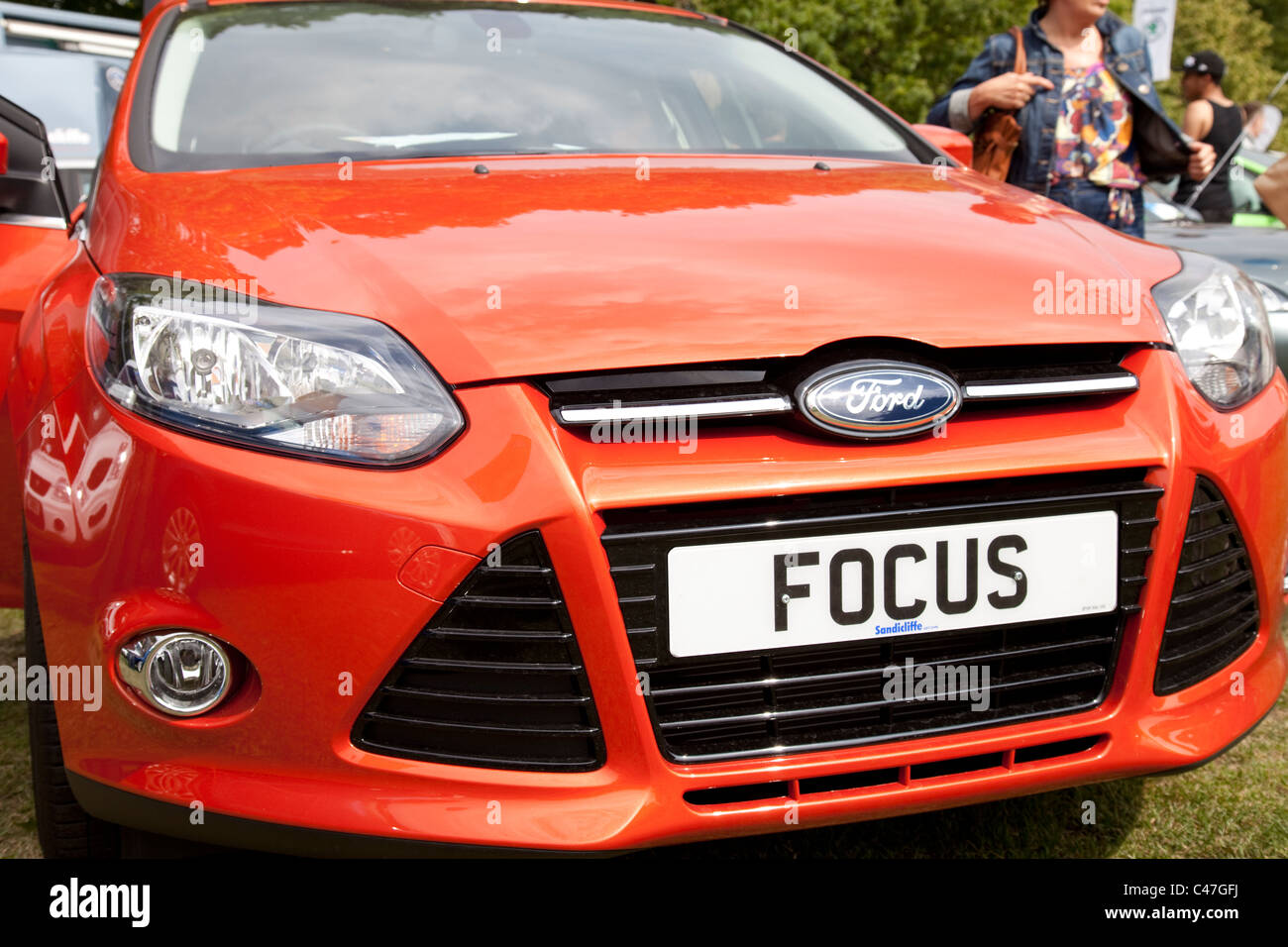 Eine gebrannte orange Farbe Ford Focus 2011 Edition England UK Stockfoto