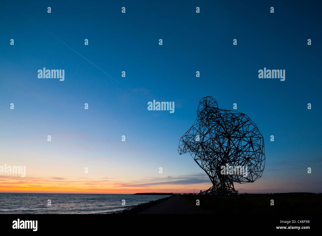 Antony Gormley Skulptur Exposition Blick über das IJsselmeer in Lelystad in Flevopolder, Niederlande, Holland. Stockfoto