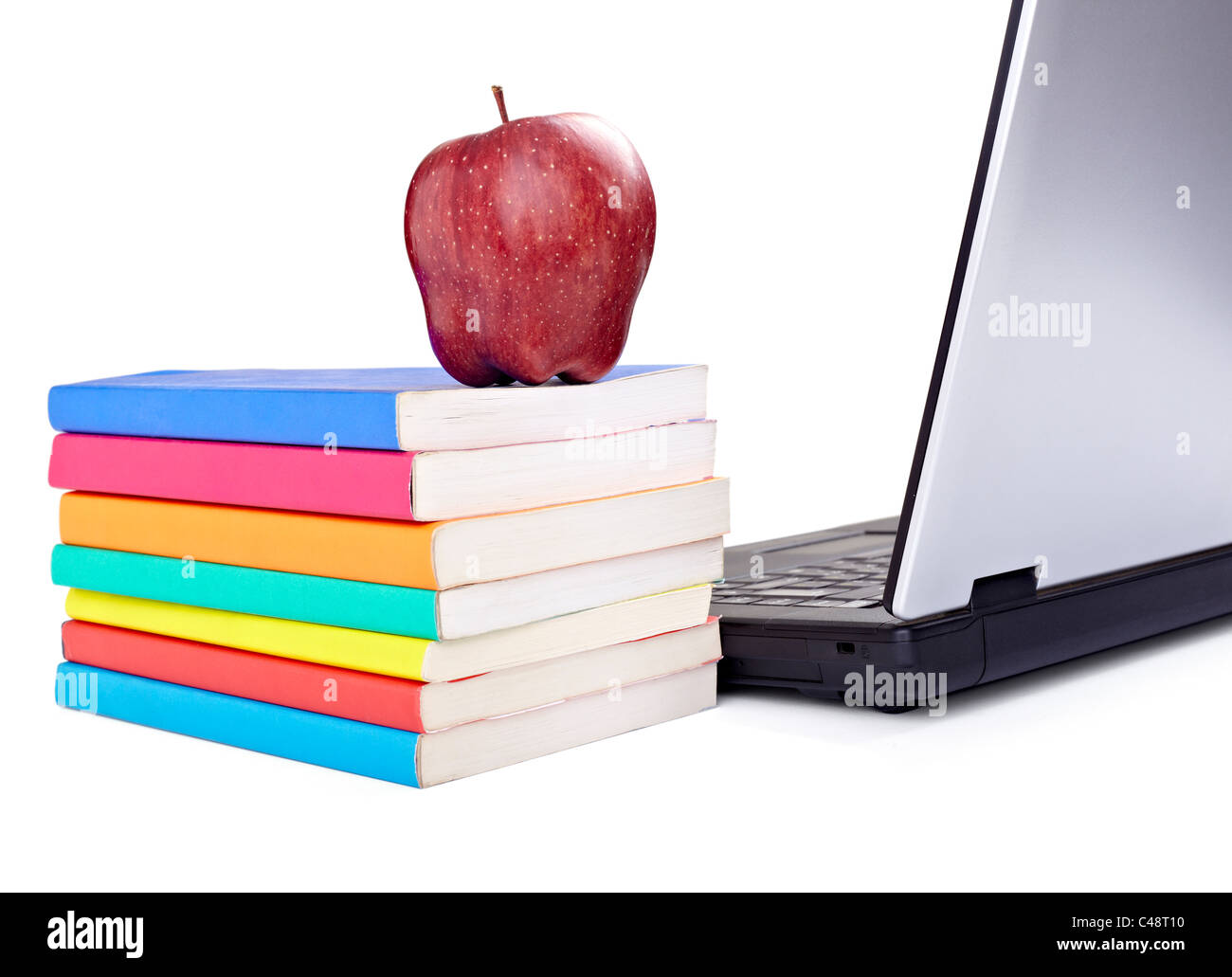 Laptop, Bücher und einen Apfel Stockfoto