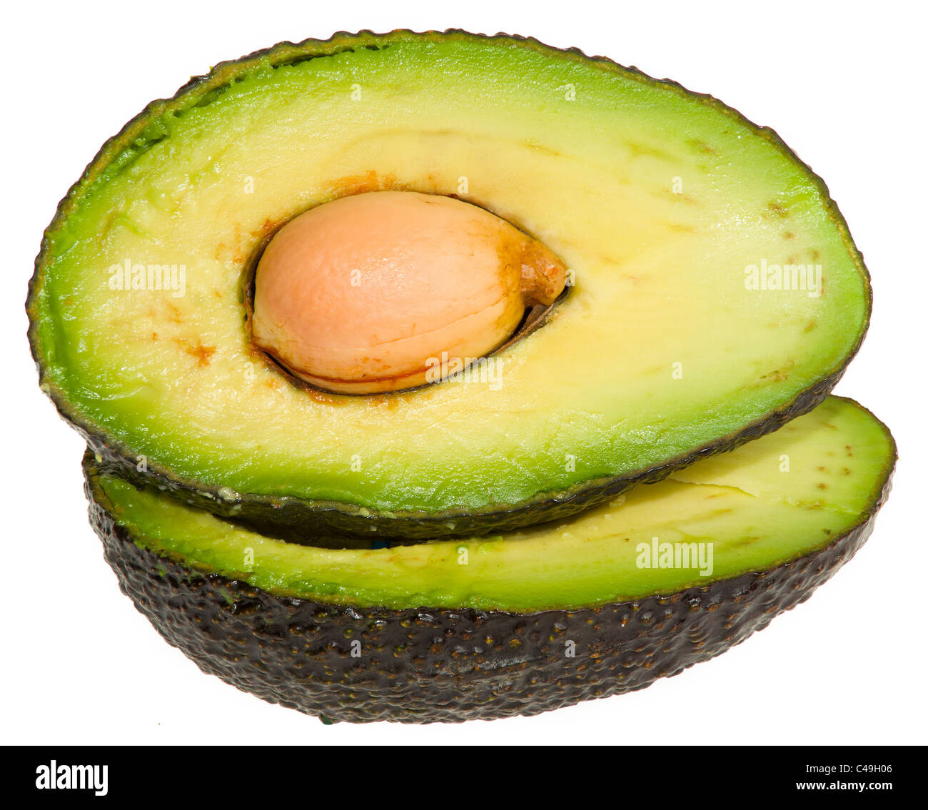 Avocado-Hälften übereinander Stockfoto