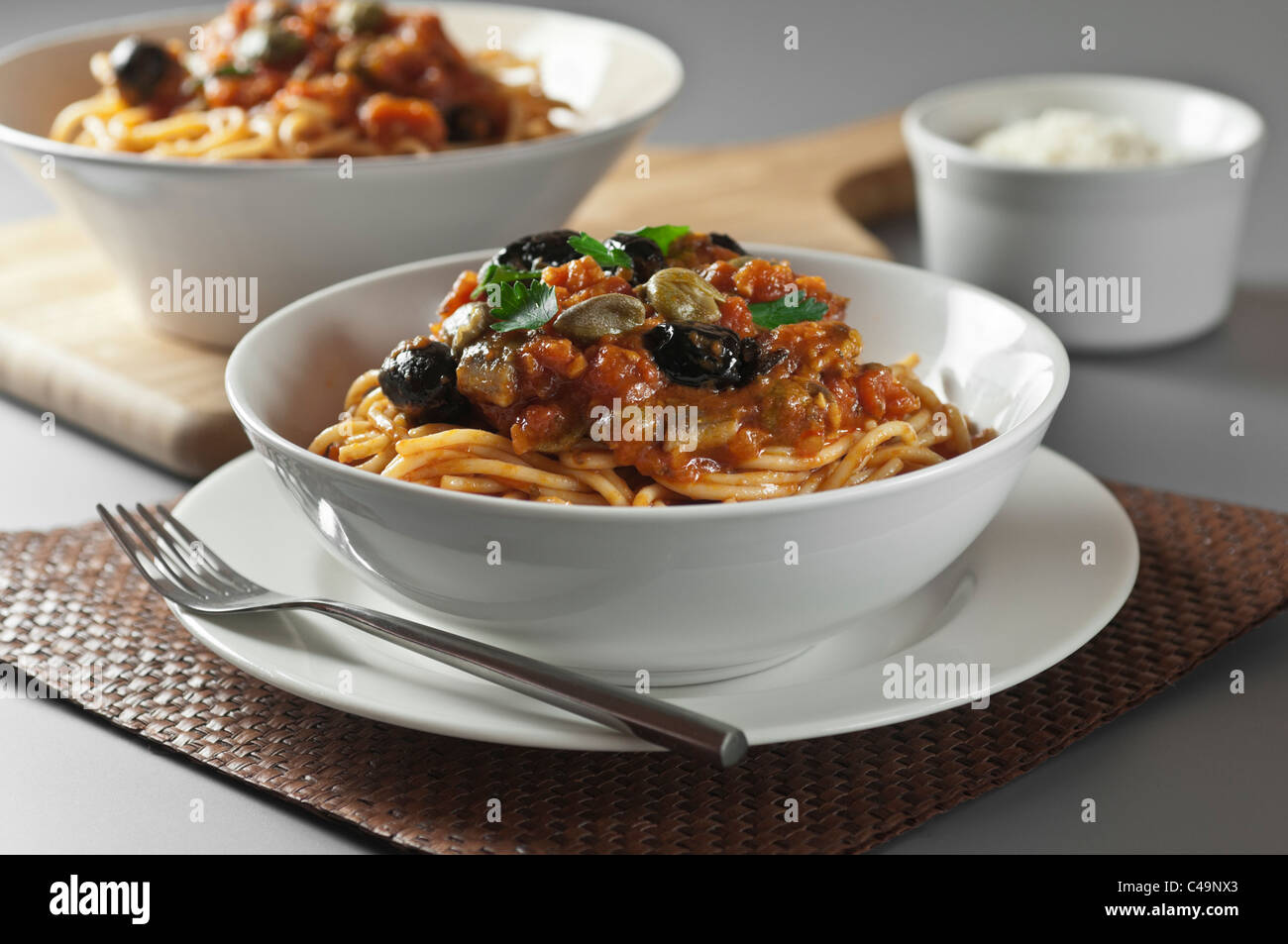 Spaghetti Alla Puttanesca italienisches Essen Stockfoto