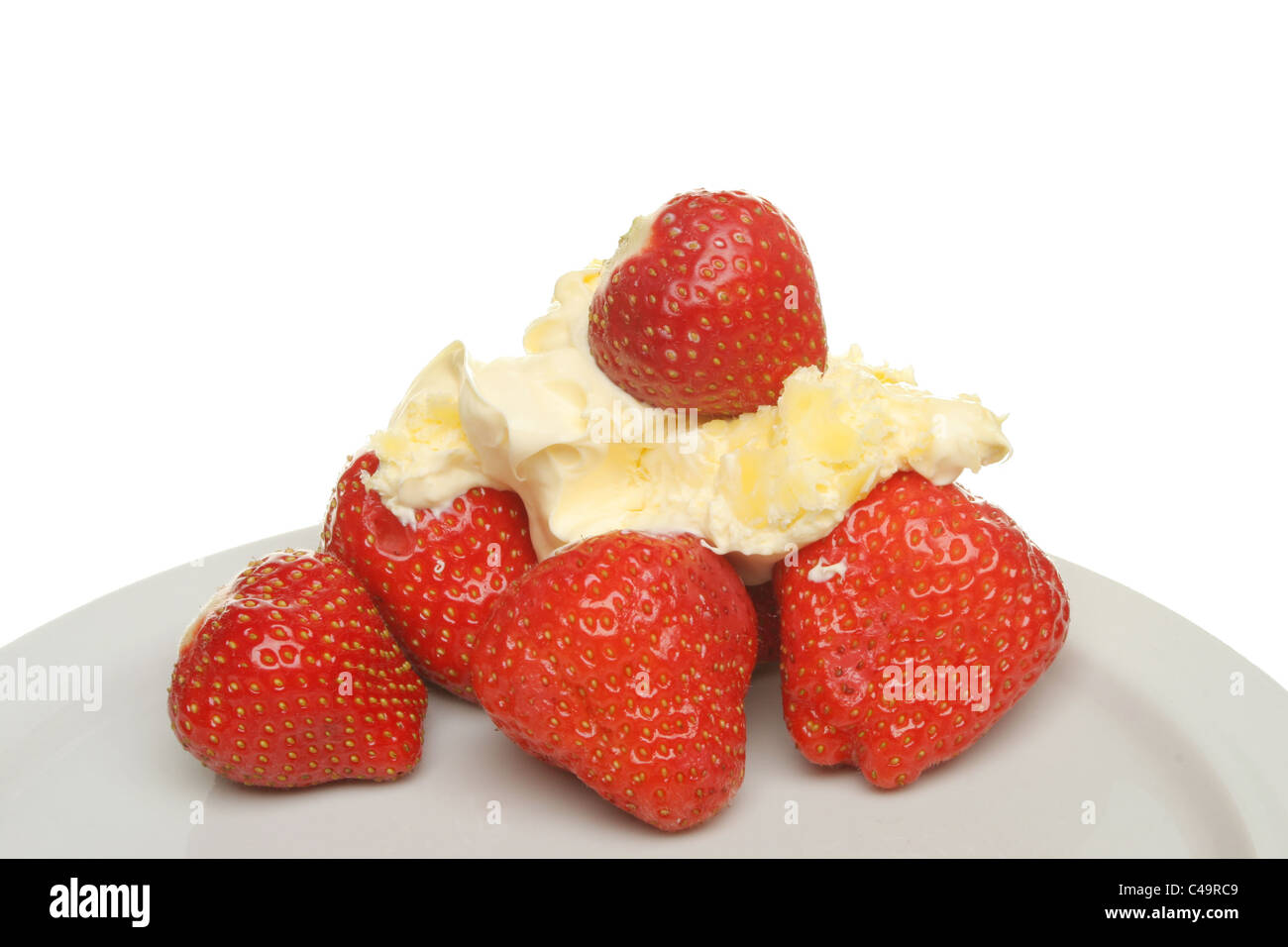 Erdbeeren und Clotted Cream auf einem Teller Stockfoto