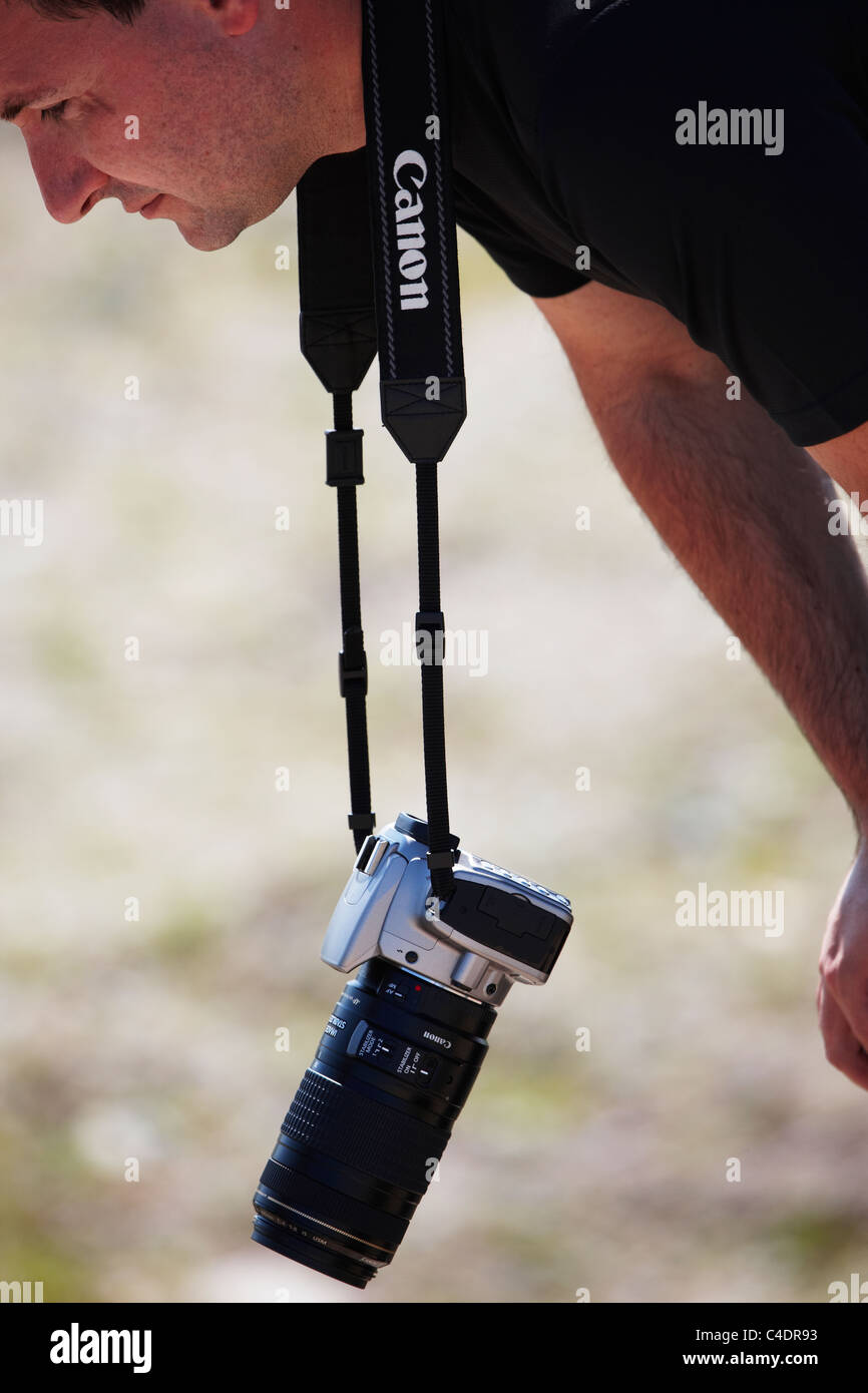 Canon digital SLR-Kamera-Runde ein mans Hals Stockfoto