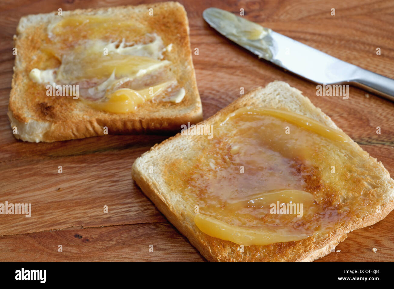 Lemon Curd und toast Stockfoto