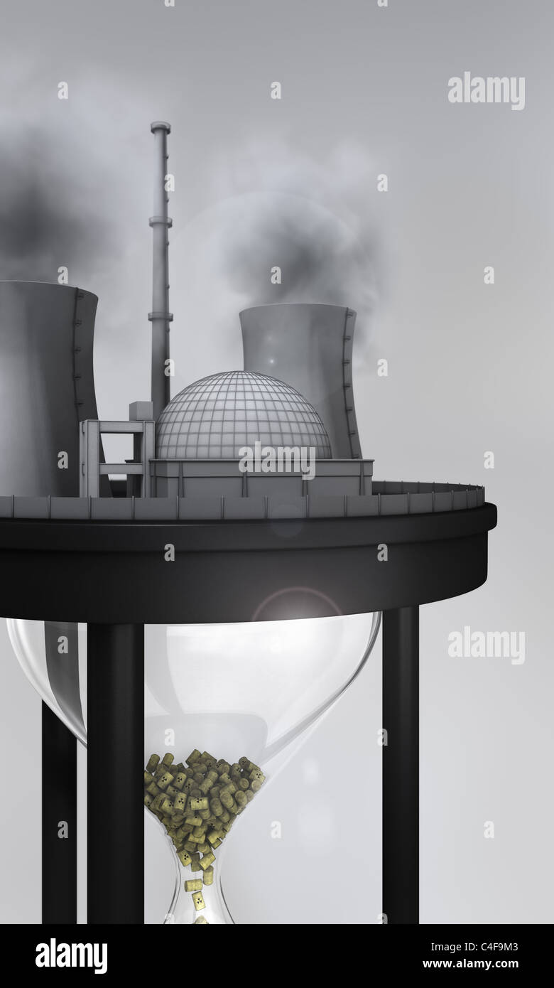 Atomkraftwerk auf riesige Sanduhr mit Atommüll in Stockfoto