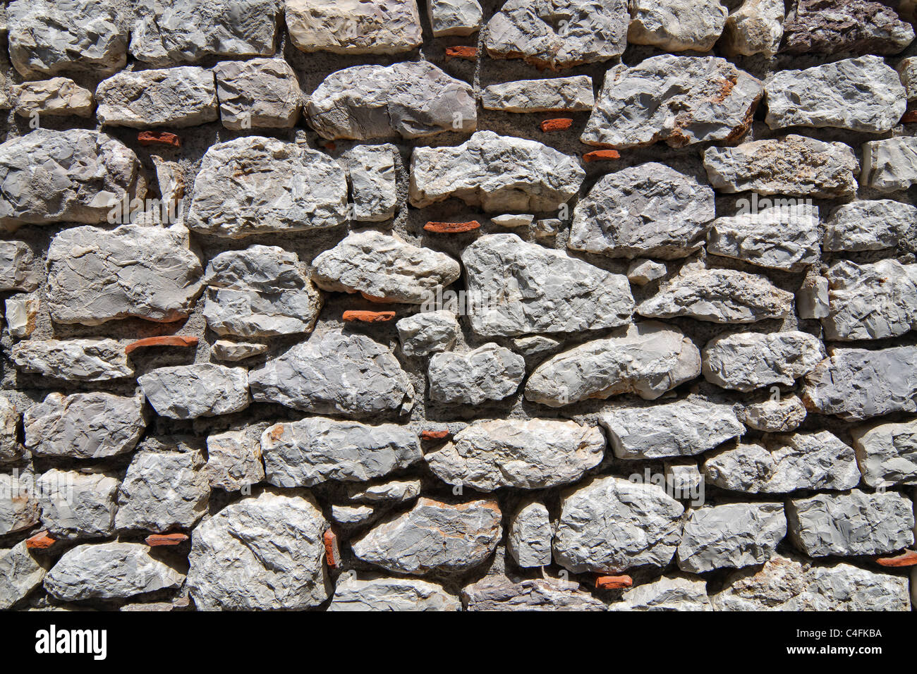 Graue Steinmauer strukturierte Häuser typischen Wand von Mani Stockfoto