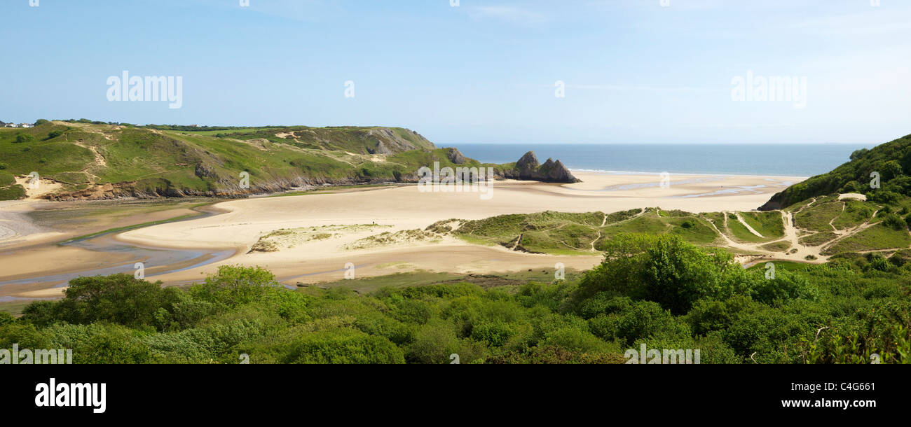 Panorama-Foto von drei Felsen Strand in Frühlingssonne Gower Halbinsel Wales Cymru GB UK British Isles Stockfoto