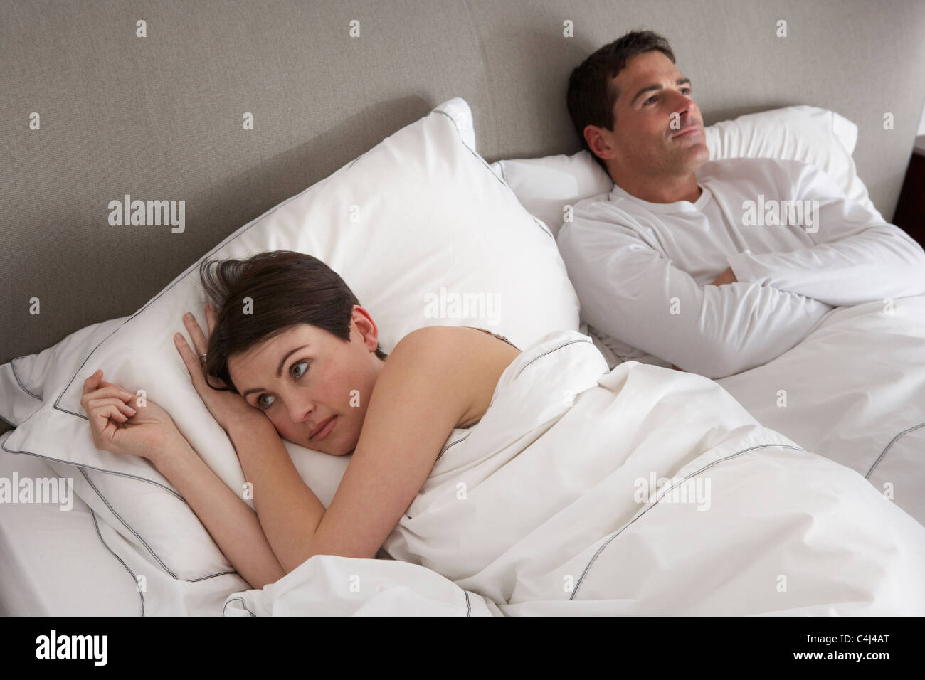 Paar mit Probleme Uneinigkeit im Bett Stockfoto